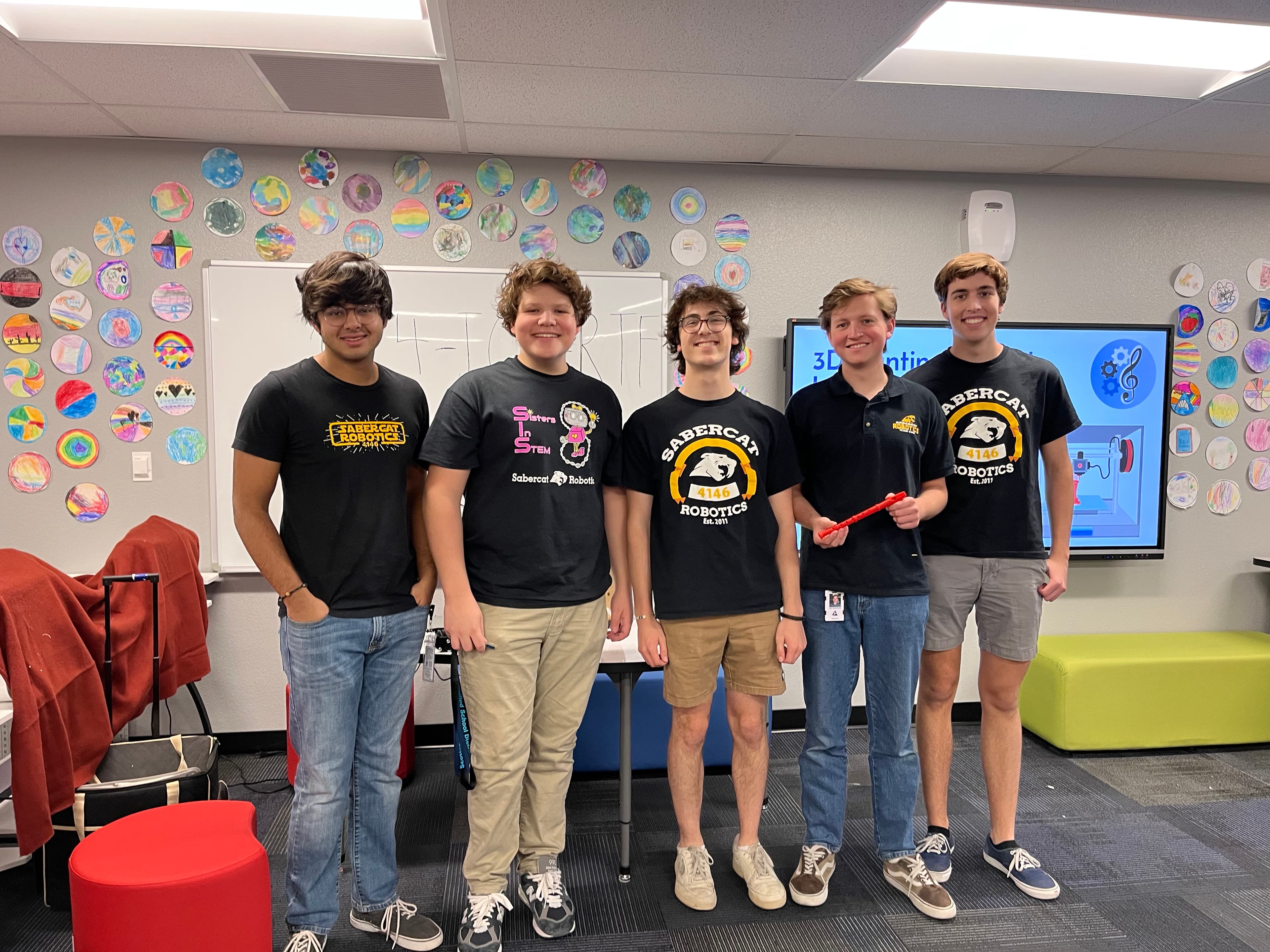 Melody Makers volunteers and leaders standing next to each other and smiling.